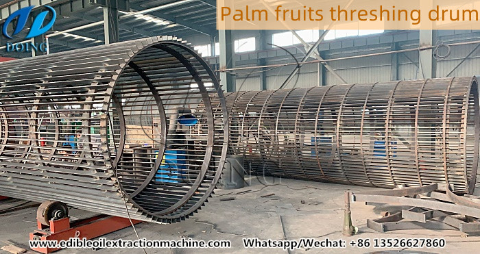 Palm fruits threshing drum.jpg